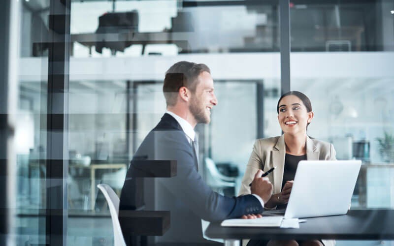 Business man and woman working together