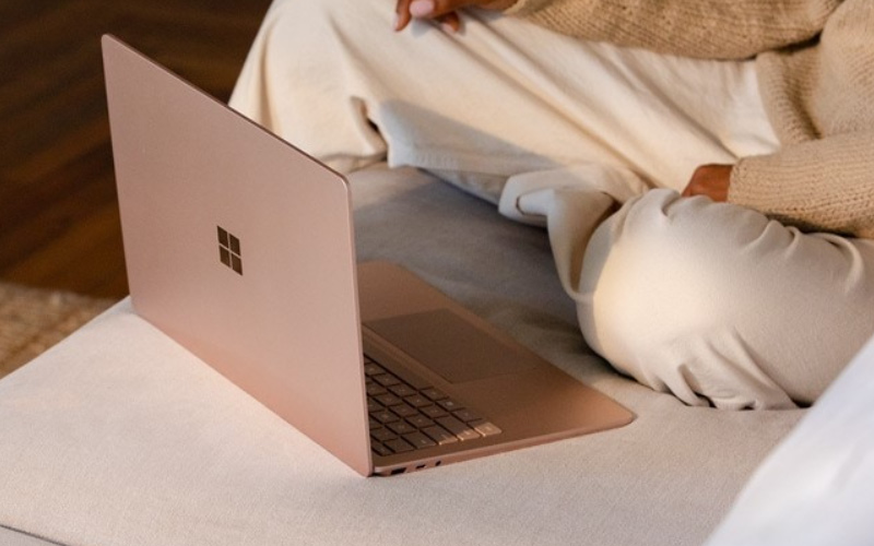Young man using the Surface Laptop 3