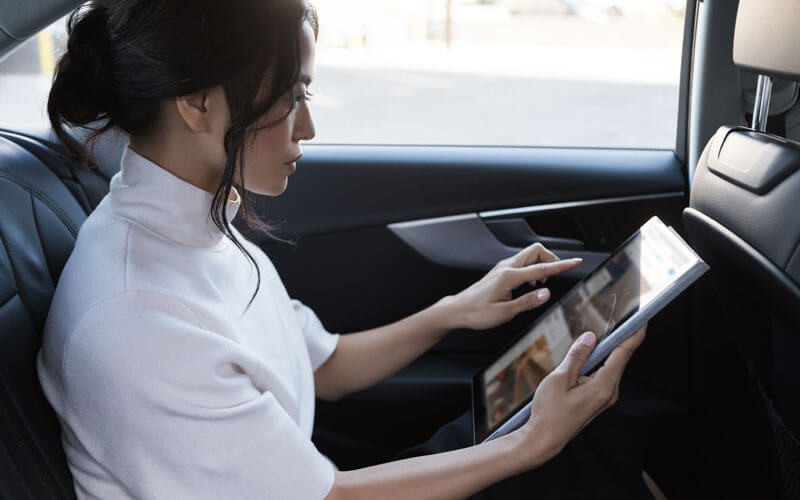 Federal employee on mobile device in car