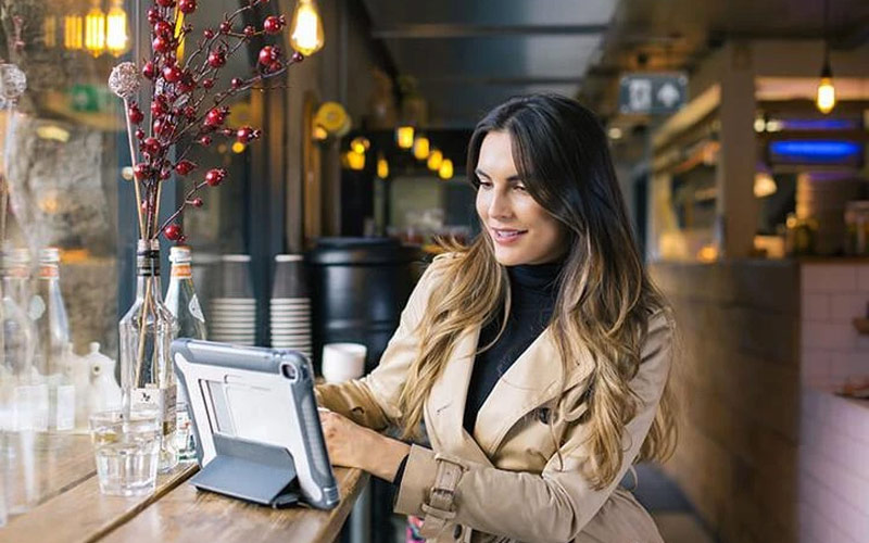 Woman working from a cafe