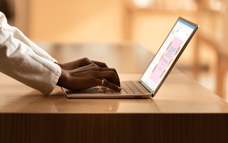 A professional using a laptop