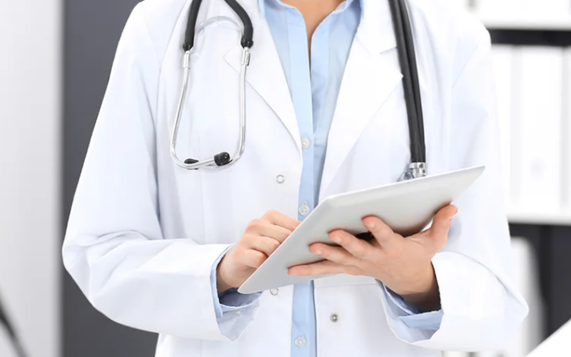 Doctor holding iPad