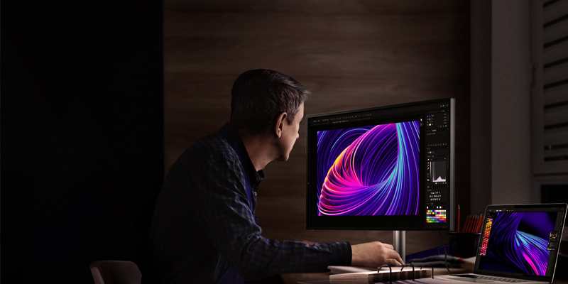 Man working on a BenQ display