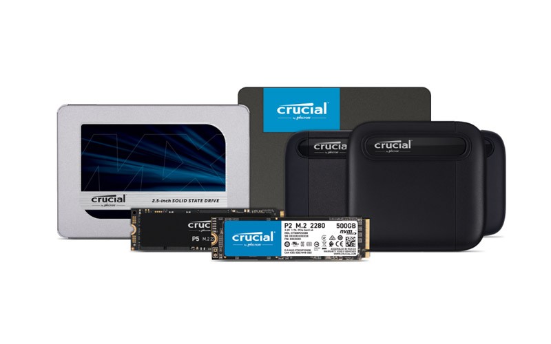 Optimise your PC performance with SSD Crucial storage device plugged into a laptop