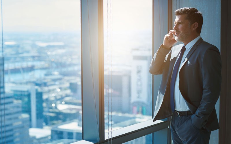 Business man speaking on mobile phone