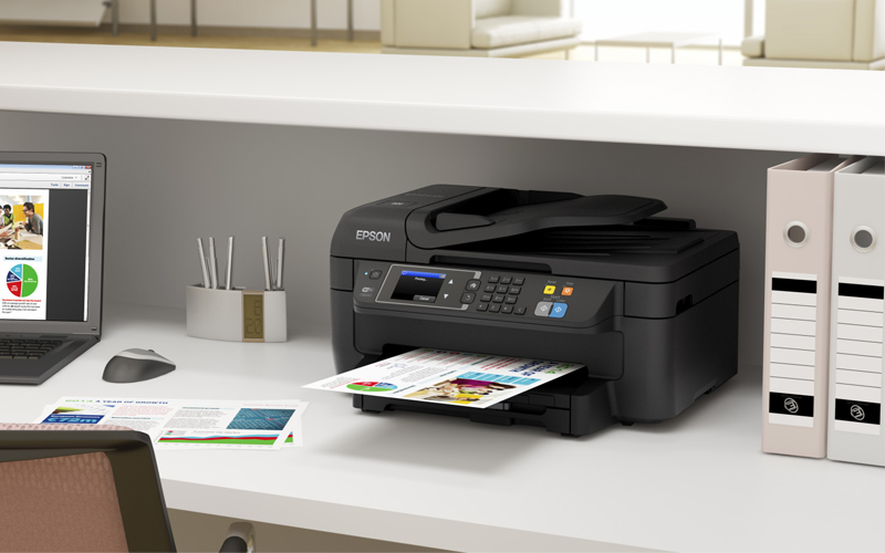 Woman working at Epson printer in open office