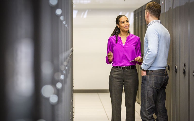 Man and woman in server room