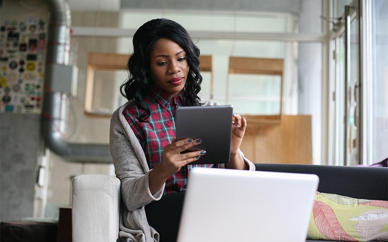 Variety of technology services Woman working on a tablet