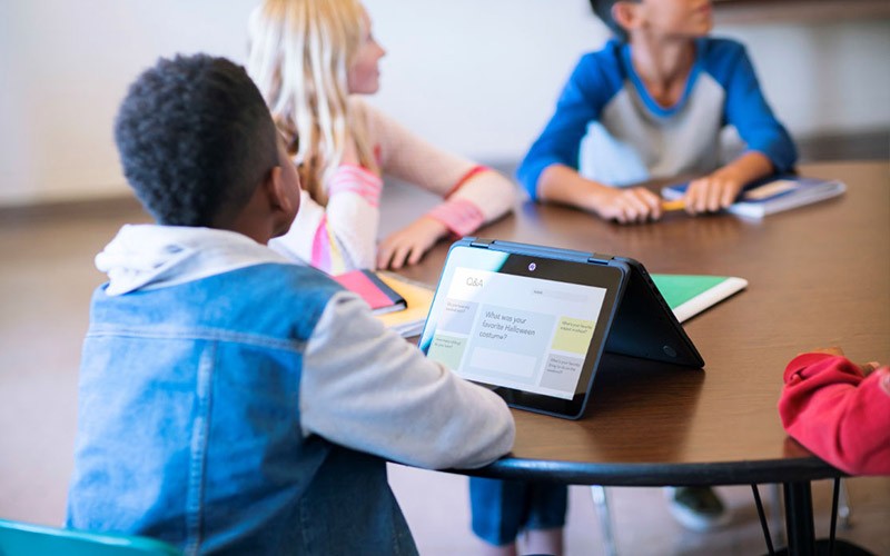 Class of students listening to a teacher