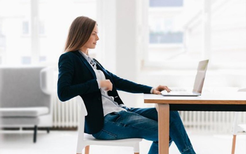 Woman working on an Intel powered laptop