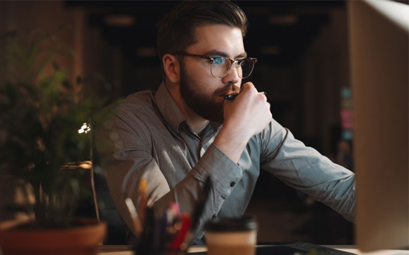Intel Solid State Drive S4500 and S4600 to protect your data center Man working at night at desk in front of desktop
