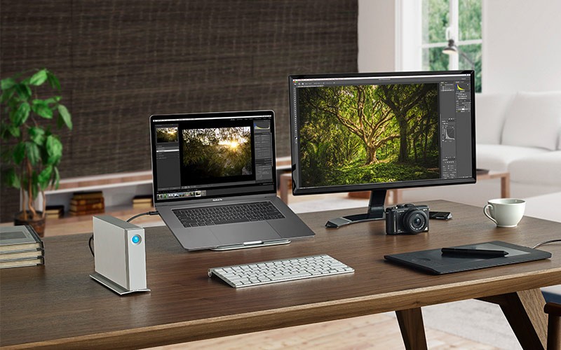 More compatibility, space and reliability LaCie d2 Thunderbolt on a desk plugged in