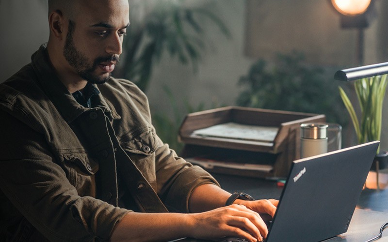 Man using a ThinkCentre M Series SFF