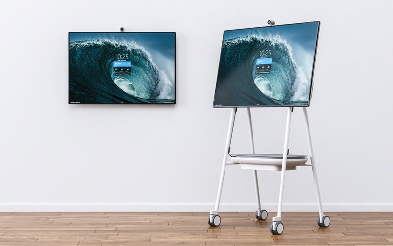 Woman using Surface Hub 2S for web meeting