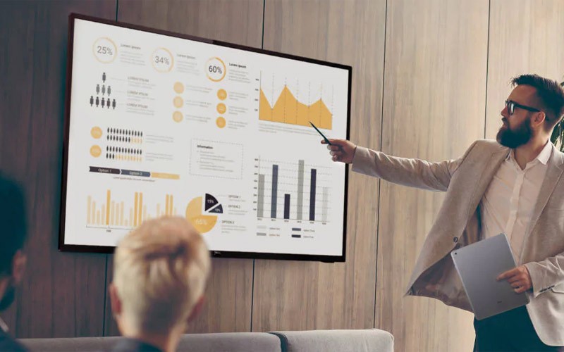 Designed for performance Man presenting with Philips display