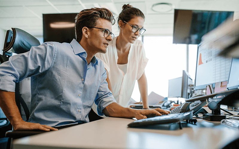 Your development and application teams can work with one common platform IT professionals work together on desktop computer