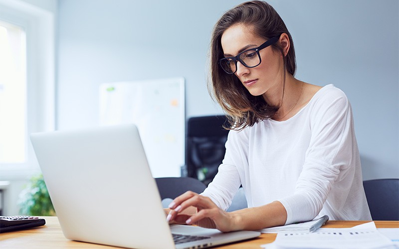 SaaS Accelerator spins up in the cloud Woman working on a laptop from home