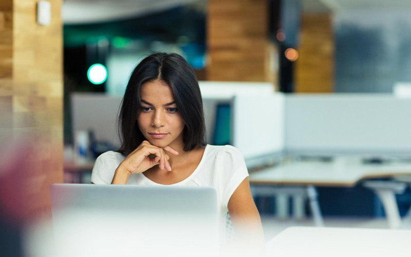 Woman working on a secure laptop