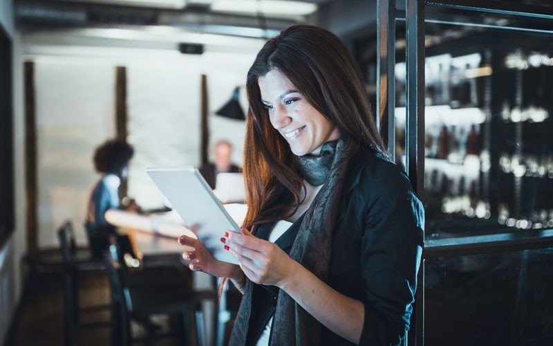Simple, secure Wi-Fi Woman using tablet device